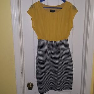 Yellow, black and white dress.
